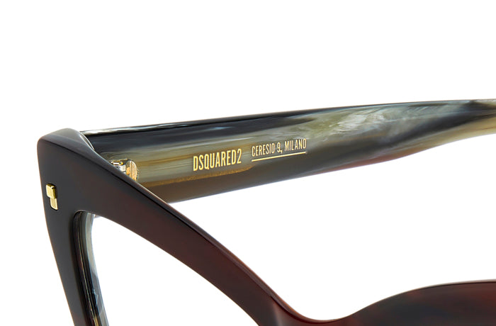 Occhiali da vista DSQUARED2 da donna modello 108867 (D2 0152) di colore avana, mostrati frontalmente su sfondo chiaro.