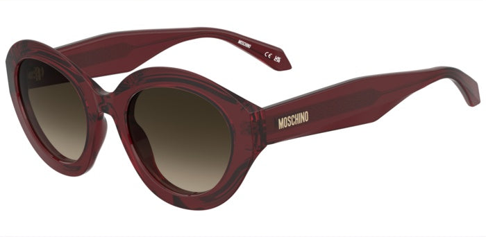 Occhiali da sole donna Moschino neri MOS200/S, modello cat-eye in acetato lucido, indossati e visibili frontalmente con lenti