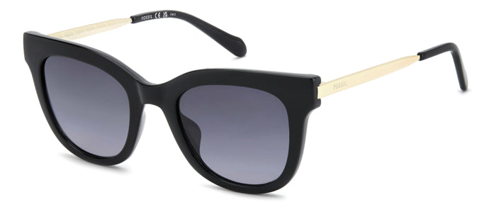Occhiali da sole donna Fossil FOS 2169/G/S con montatura Avana e lenti scure, indossati da una modella.