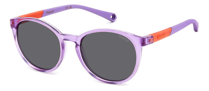 Occhiali da sole Polaroid Kids modello PLD 8059/S di colore rosa con lenti scure, mostrati frontalmente su sfondo neutro.