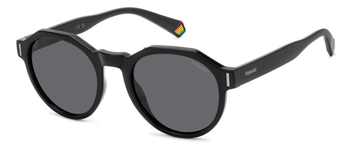 Occhiali da sole Polaroid PLD 6207/S unisex con montatura colore avana e lenti scure polarizzate, in primo piano.