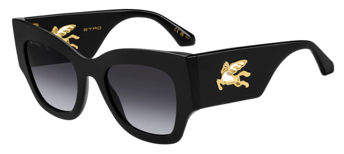 Occhiali da sole Etro modello 0076/S neri indossati da una donna, con montatura in acetato e lenti scure, su uno sfondo lumin