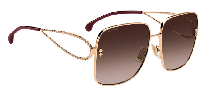 Occhiali da sole Etro 207871 (0070/S) da donna con montatura in metallo color oro e lenti scure, posti su uno sfondo neutro p