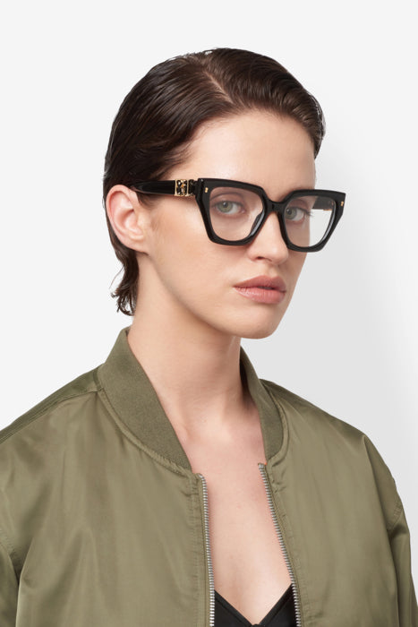 Occhiali da vista DSQUARED2 da donna, modello D2 0186, colore avana, mostrati su sfondo bianco, con dettagli ben visibili.