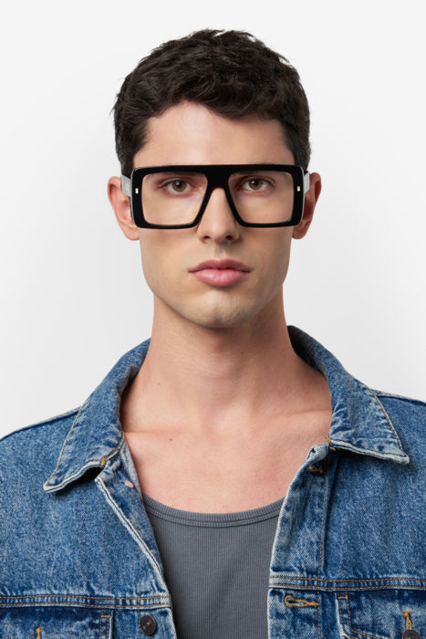 Occhiali da vista neri DSQUARED2 modello D2 0166 da uomo, montatura squadrata in acetato di fronte su sfondo chiaro