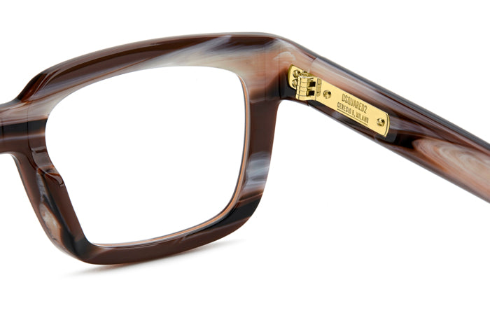 Occhiali da vista Dsquared2 D2 0144 da uomo, montatura verde con lenti trasparenti, posizionati su uno sfondo neutro.